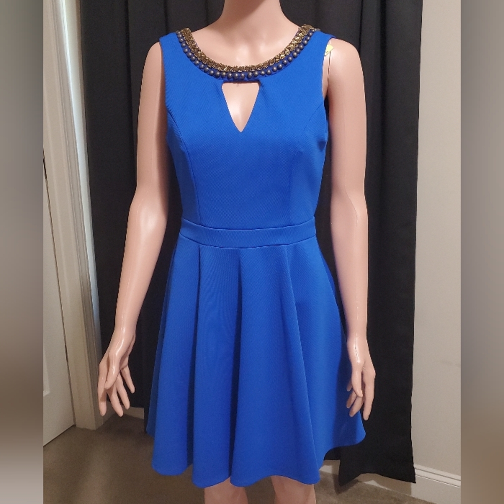Gorgeous dress by XoXo. - Picture 1 of 2